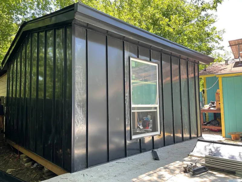 Black standing seam metal wall panels for Roof Inspection in Guadalupe